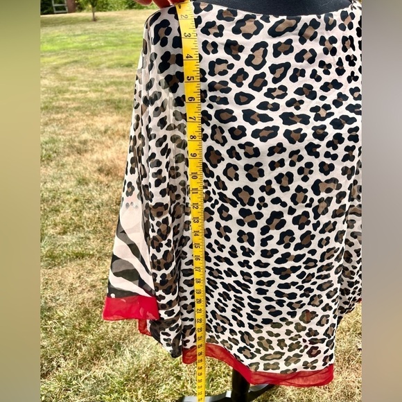 Nordstrom’s Tarnish OS Fits Most
Poncho Shawl Wrap Animal Print Leopard New Tags - Picture 3 of 9